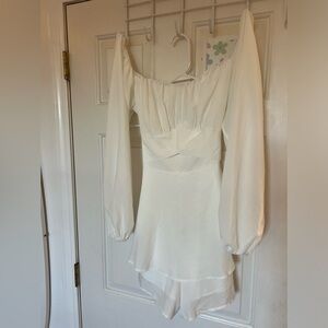 White off the shoulder romper that ties in the back